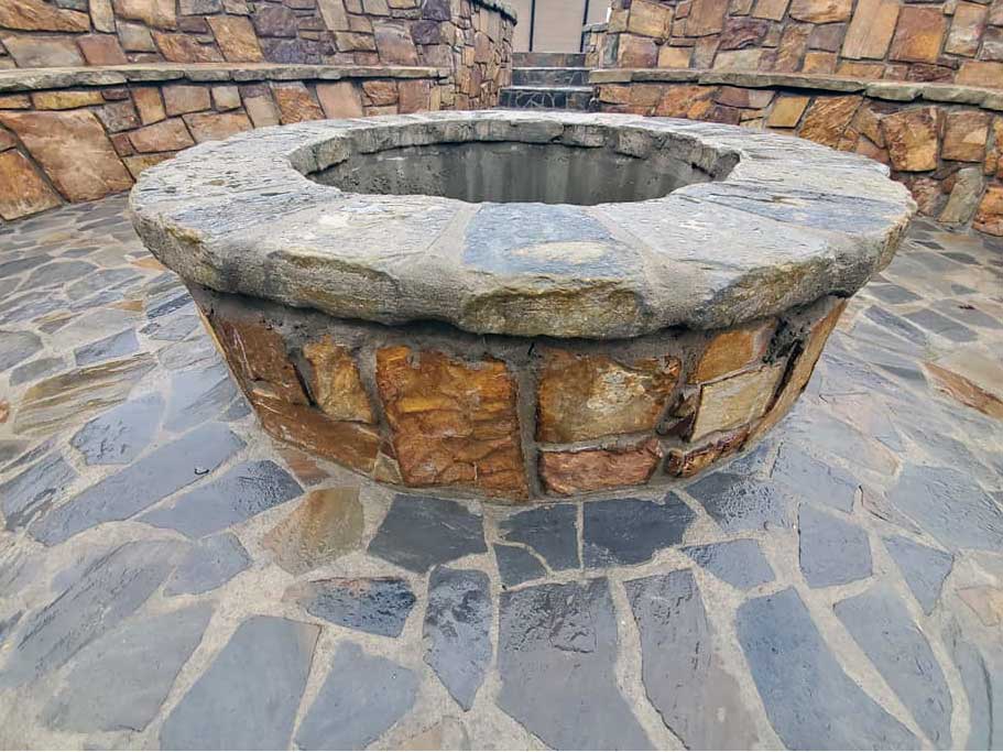 Custom firepit made from stone by American Masonry Arts in Northwest Arkansas