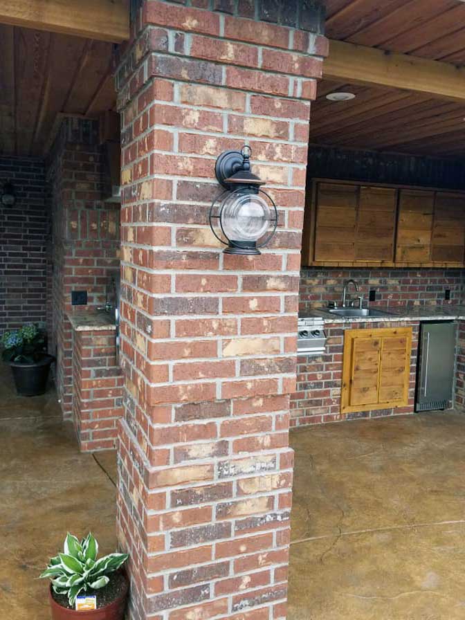 Outdoor cooking area made by outdoor kitchen designer American Masonry Arts in Northwest Arkansas